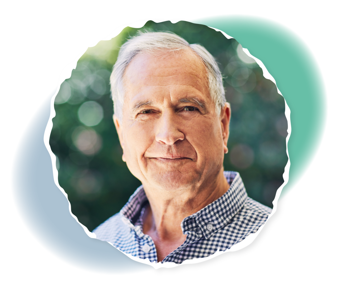 Chronische myeloische Leukämie Ein älterer Mann lächelt in die Kamera.